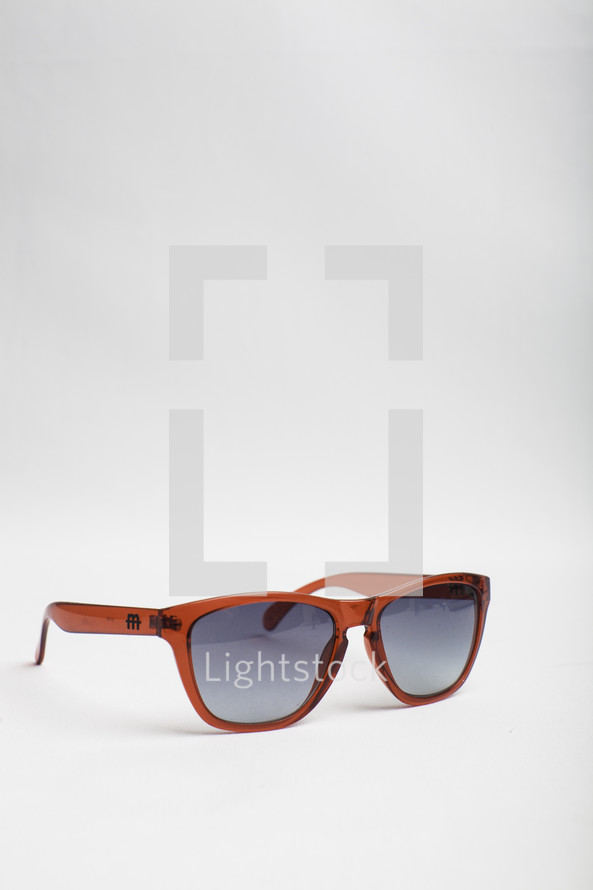 sunglasses against a white background 