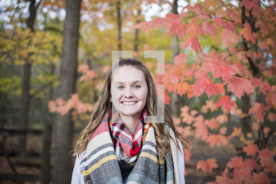 smiling teen girl in fall 