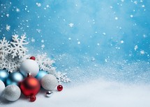 Christmas background with snowflakes and baubles on blue background