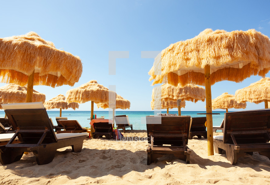 thatched beach umbrellas 