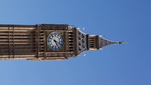 Vertical timelapse of Big Ben during the day showing the creeping shadow of the sun