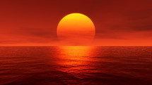 orange glow over water at sunset 
