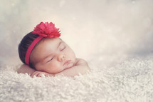 flower headband on a newborn girl