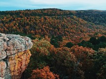 view of a valley in fall from a mountain top 