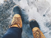 boots standing on ice 