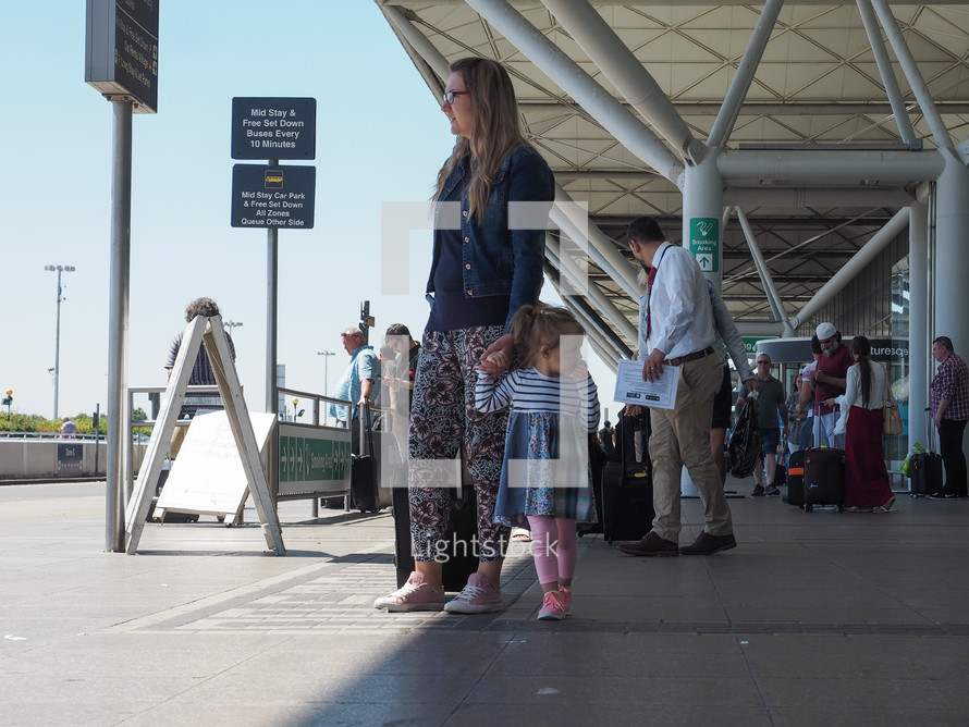 STANSTED, UK - CIRCA JUNE 2018: Travellers at London Stansted airport design by architect Lord Norman Foster