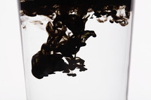 black ink in clear water 