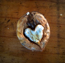 A walnut in the perfect shape of a heart