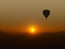 hot air balloon at sunset 