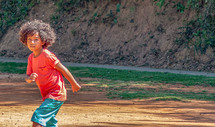 child running in a park 