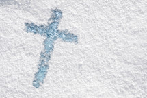 Cross in the new snow.