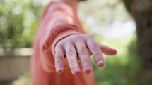 Hand Of A Boy In Balance And Connected In The Calabrian Nature