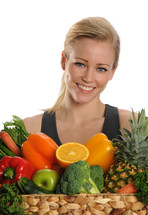woman holding a basket of fruit and vegetables 
