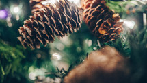 artificial Christmas tree with pine cones 