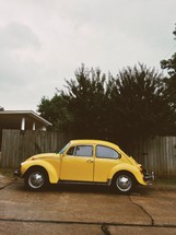 old yellow Volkswagen Beetle 