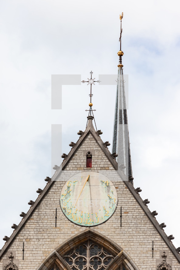 sundial and steeple in Amsterdam 