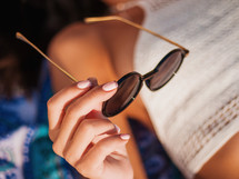 Woman Hand Holding Black Sunglasses 