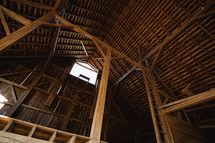 High, wooden, vaulted ceiling in a barn