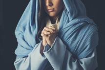  Mary in a blue shroud with praying hands 