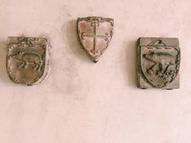 shield hanging on a wall 