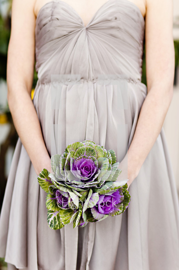 bridesmaid holding a bouquet