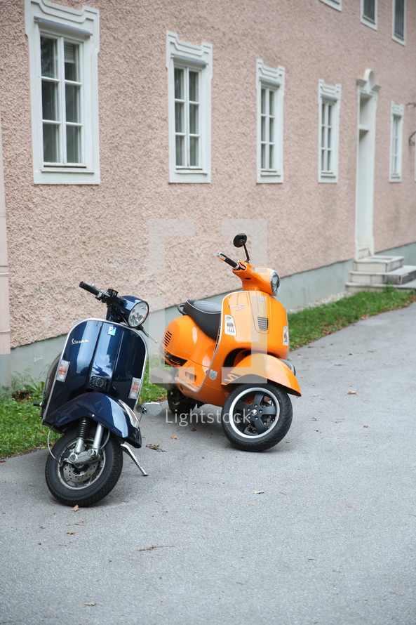 two parked scooters 