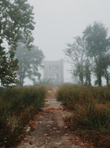 abandoned building in the fog 