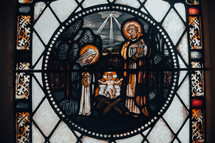 manger Jesus stained glass window 
