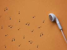 earbuds and music notes 