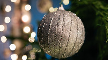 Silver Christmas ball on tree