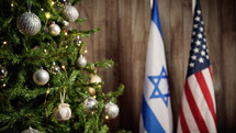 Israel and American Flags near Christmas tree