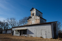Old white feed store building