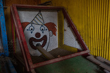 Old mini golf game with clown face