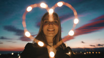 Woman With Heart Of Fairy Lights