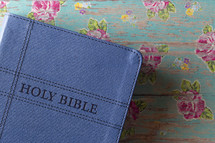 Bible on a floral background 