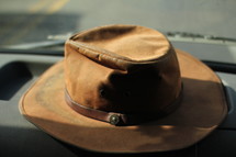 hat on a dashboard 