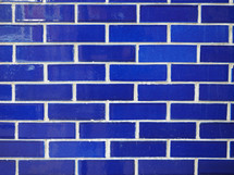blue brick wall useful as a background