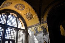 Light streams in the Hagia Sophia where Christ is depicted in the mosaics.