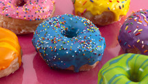 rainbow sprinkled donuts