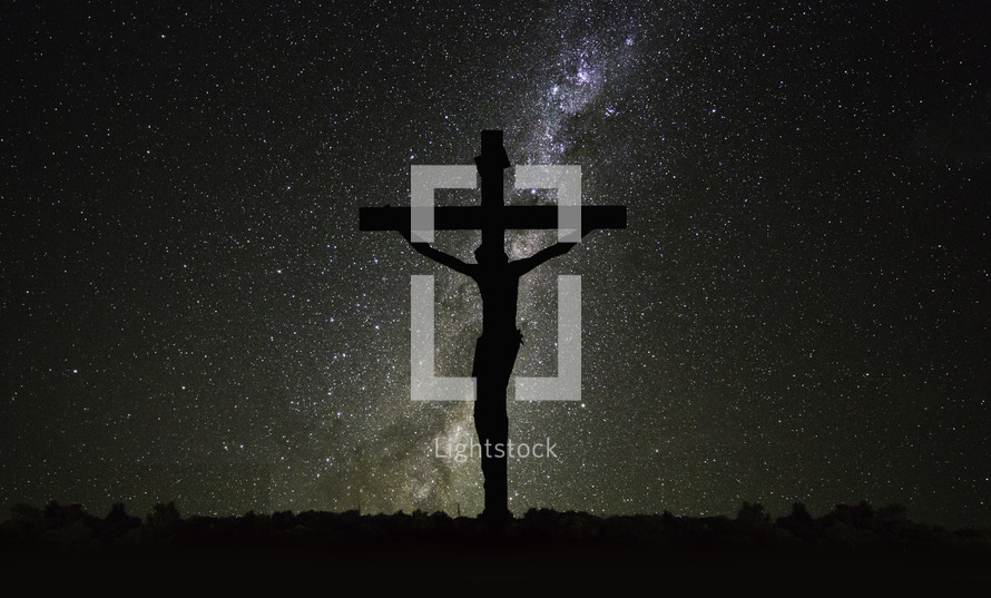 Jesus on the cross under a starry sky