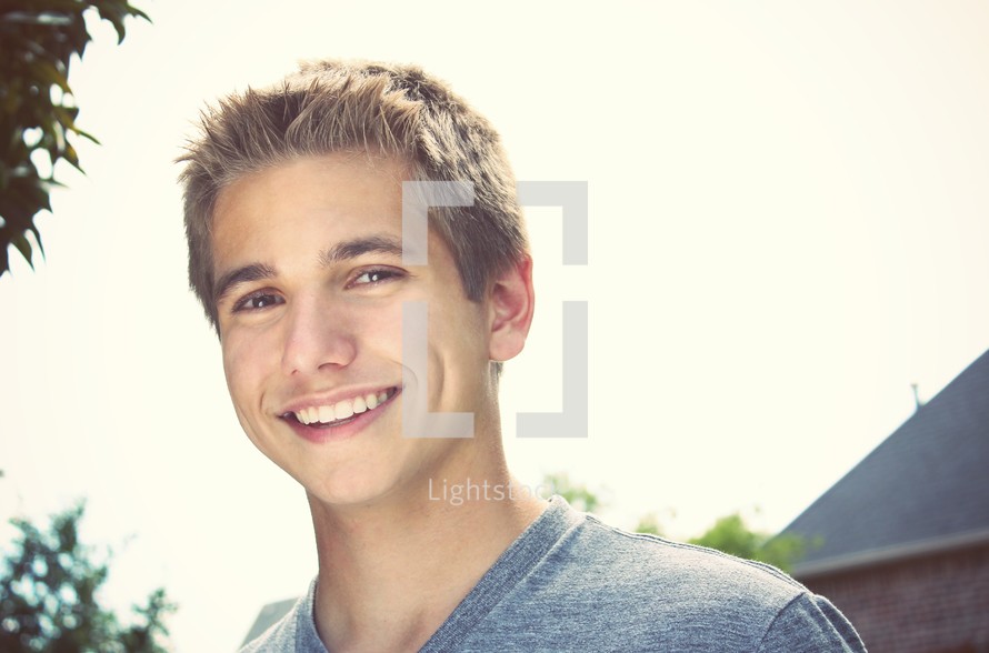 teenage boy smiling