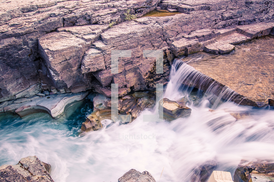 flowing water over rocks 