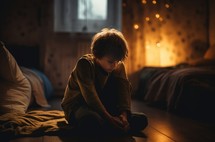 A scared 7-year-old child sits in a dimly lit room, exuding fear. Warm colors create an intimate atmosphere