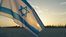 Israel flag Waving In the Sky on the beach