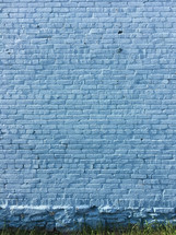 Blue painted brick wall background 