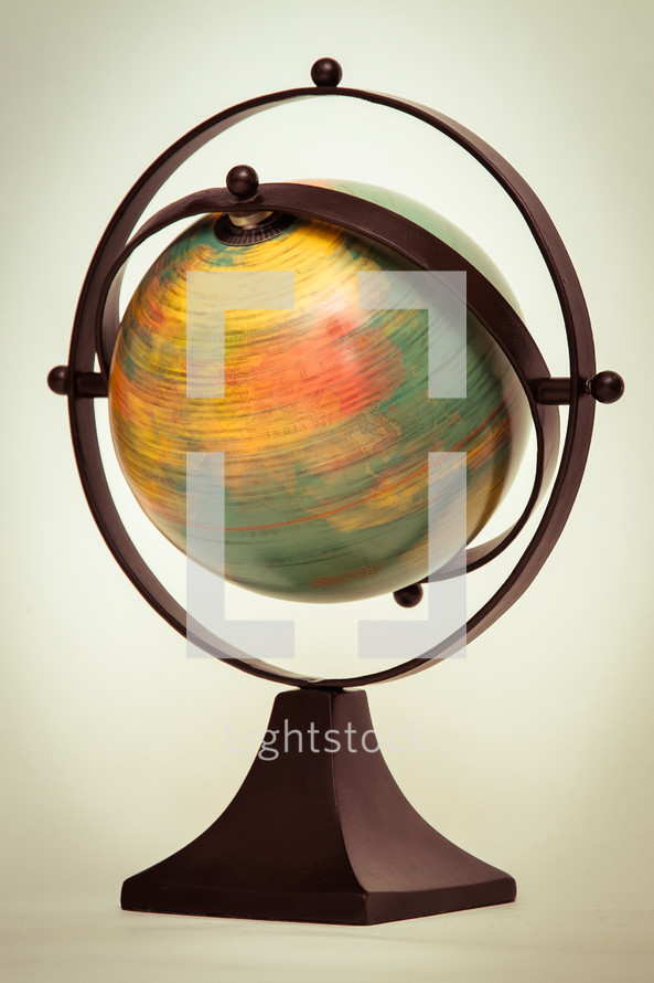 Spinning globe against a white background 