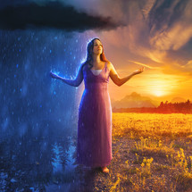 A woman stands alone with a storm on one side and beautiful sunshine on the other