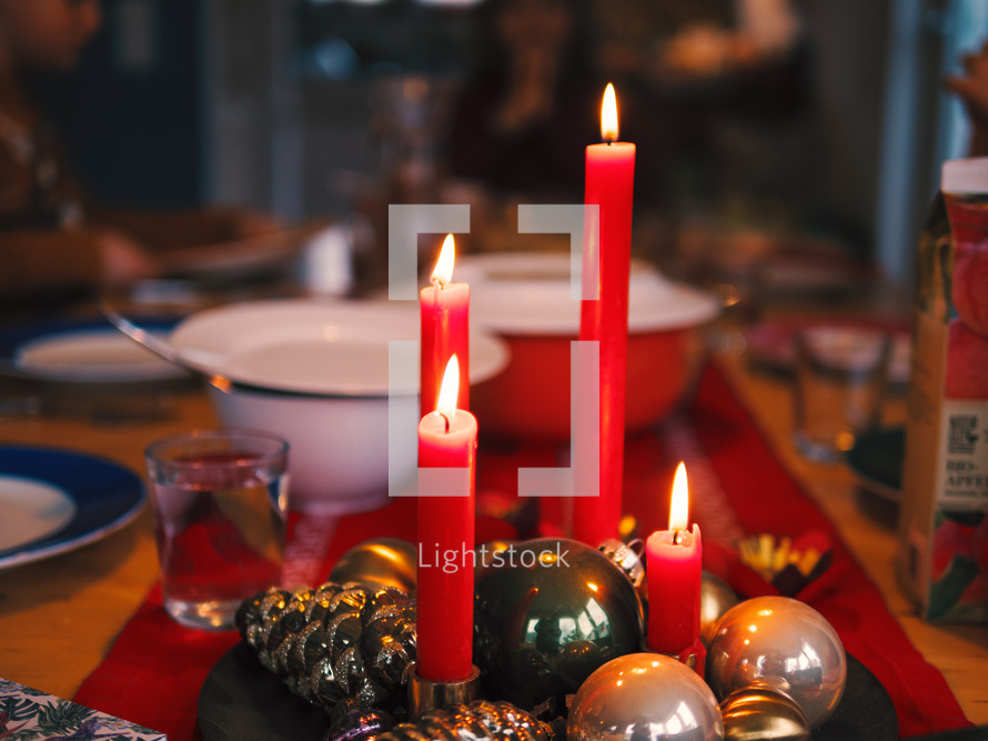 red candles on a table 