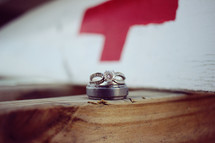wedding rings and rescue sign 