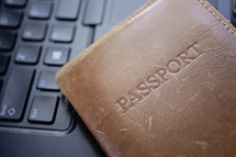 a passport on a keyboard 
